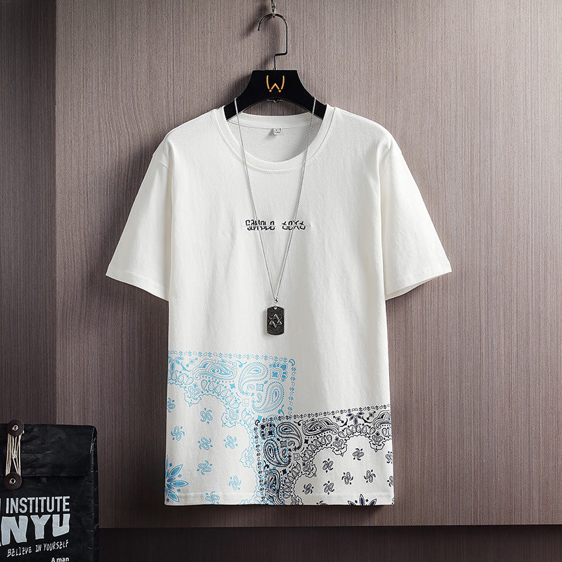 Men’s Patchwork Paisley Print T-Shirt – Streetwear Graphic Tee with Bandana Hem - ExceLux.