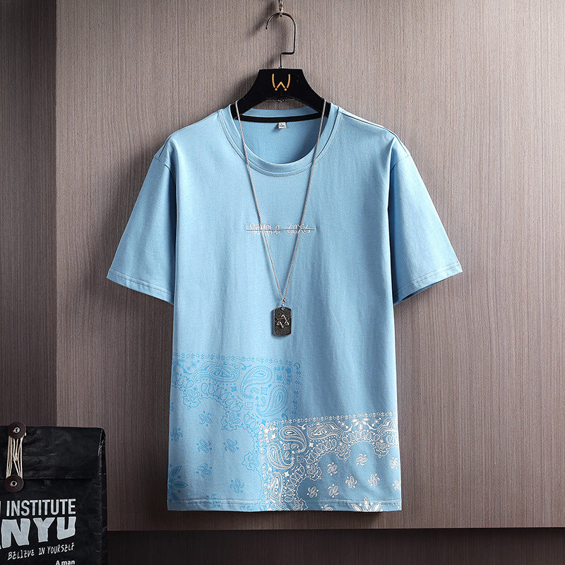 Men’s Patchwork Paisley Print T-Shirt – Streetwear Graphic Tee with Bandana Hem - ExceLux.
