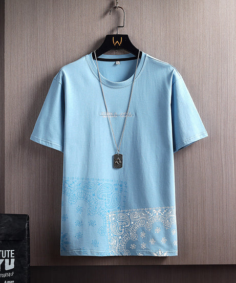 Men’s Patchwork Paisley Print T-Shirt – Streetwear Graphic Tee with Bandana Hem - ExceLux.